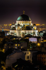 Naklejka premium Belgrade, Serbia - April 10, 2017: Belgrade panorama with the temple of St. Sava by night