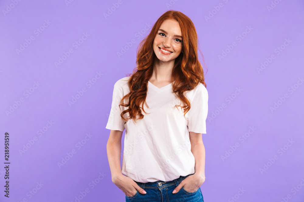 Poster Portrait of a redhead young girl standing