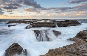 Stranded  Rock Fisherman almost taken by the ocean