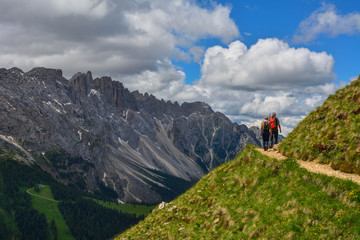 Fototapeta premium Italy Dolomites Latemar hikers