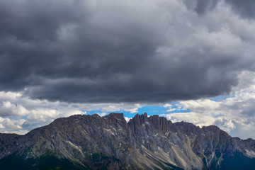 Italy Dolomites Latemar stormcloud