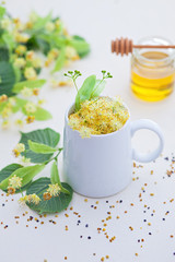 cup of linden tea and linden honey