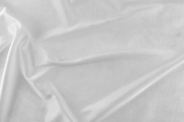 Smooth white silk or satin texture.