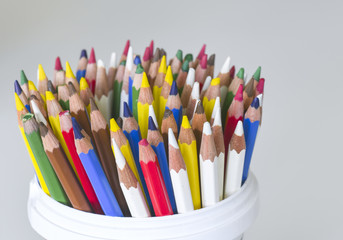Many different colored pencils