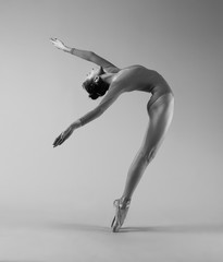 A ballerina makes a deflection backwards