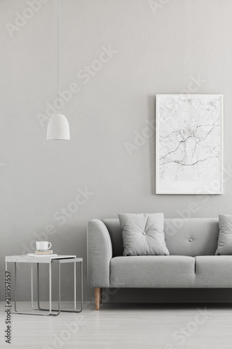 real photo of map poster hanging on the wall in living room interior with grey sofa - Hanging End Tables real photo of map poster hanging on the wall in living room interior with grey sofa - Hanging End Tables