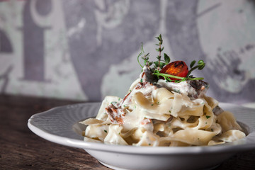 Pasta with mushrooms in creamy sauce