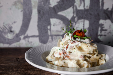 Pasta with mushrooms in creamy sauce