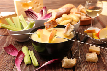 cheese fondue with fruit and vegetable