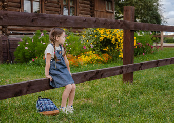 little naughty Russian girl spends summer vacation in the village. Preschool barefoot to have fun...