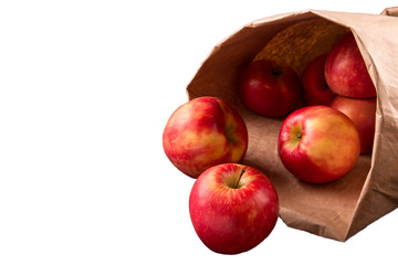 Paper pocket with red apple isolated