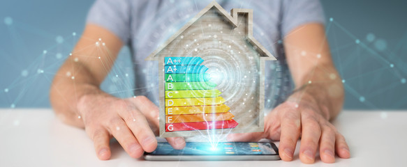 Businessman using 3D rendering energy rating chart in a wooden house