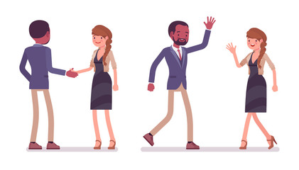 Male and female friends greeting © andrew_rybalko