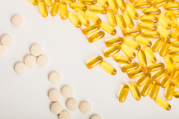 Tablets, pills or vitamins. Fish oil in capsules. Baby and female vitamins.