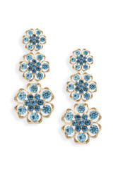 gold earrings with blue diamonds isolated on white