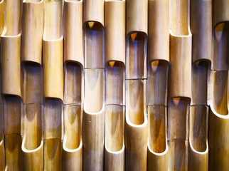 Home decoration concept and abstract background. Closeup view of bamboo wall decoration. Bamboo texture and background for wall design. Copy space.