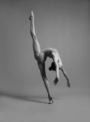 Flexible girl in a string