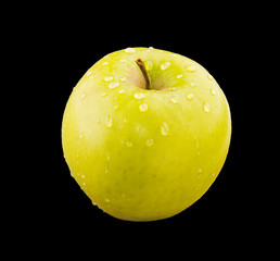 Green apple with water drops