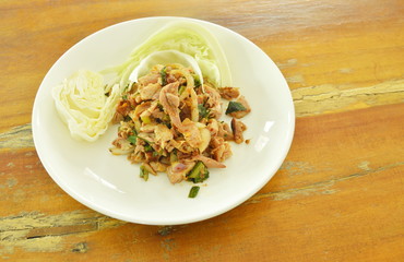 spicy grilled chicken Thai salad eat with cabbage on plate