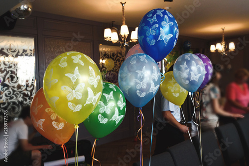 Many Colorful Balloons With Butterflies Decoration In Restaurant