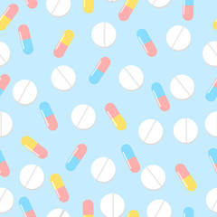 Colorful pills seamless pattern. Vector background. Seamless texture realistic tablets on blue background
