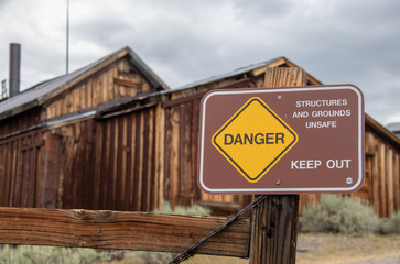 A Warning Sign in the Ghost Town of Bodie Located in California's Eastern Sierra Mountains