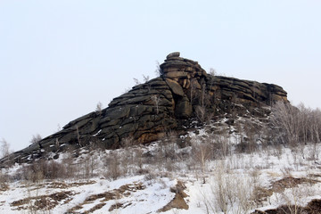 A large mountain of natural origin made of stone