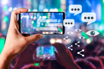 People hands use smart phones record video concert music festival live streaming video on internet...