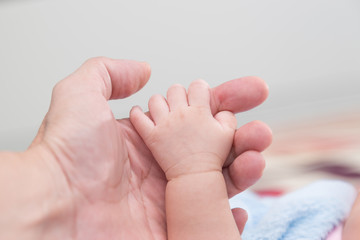 Hand of newborn.