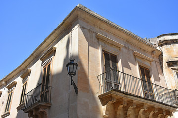 Italy, Lecce,  ancient buildings and streets of the old town, views and details, doors, windows and...