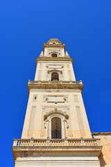 Fototapeta premium Italy, Lecce, Duomo square, in Baroque style, bell tower, view and architectural details.