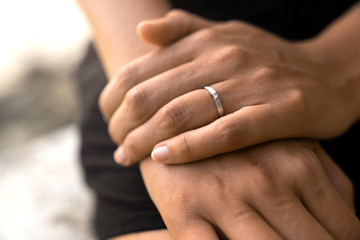 silver engagemnet ring on females hand after wedding proposal