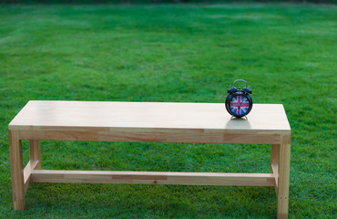 Alarm clock on a bench