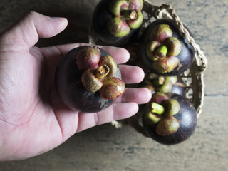Mangosteen handles placed on wooden boards.