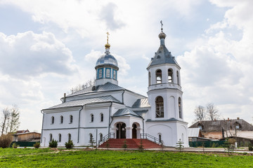 Fototapeta na wymiar Church of Elijah the Prophet in the city park in Elnya, Russia