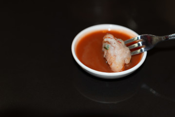 Closeup dim sum steamed with sauce on dark table. Chinese breakfast style in southern of Thailand.