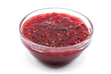 Cranberry sauce in bowl for Thanksgiving dinner isolated on white background