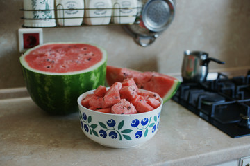 Pieces of watermelon in a large bowl.