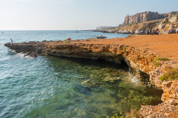 Fototapeta na wymiar Santa Margherita,Bue Marino and Macari beach with Monte Cofano mount in the background