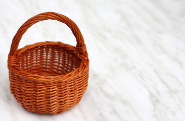 wicker basket on light background