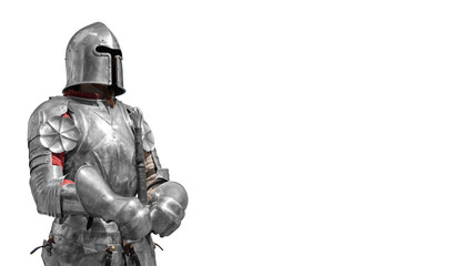 Knight in shiny metal armor on a white background. - obrazy, fototapety, plakaty