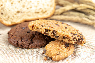 Chocolate cookies on wooden table.