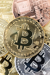 Fototapeta na wymiar Bitcoin cryptocurrency token pile background
