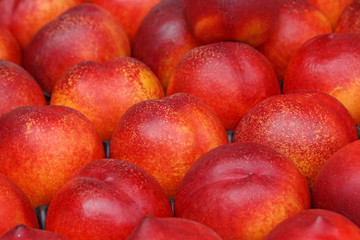 Fototapeta na wymiar close up of nectarines on market