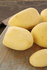 Naklejka na ściany i meble preparing fresh potatoes