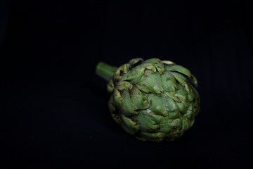 Obraz premium artichoke on the black background