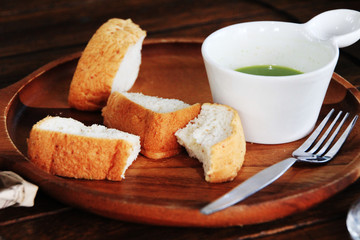 Steam bread and green tea sauce put in the wood tray.