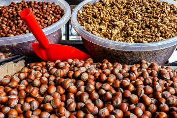 Nut background of hazelnut fruits. Food background. Top view of hazelnut nuts.