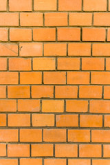 Obraz premium Ściana jaskrawa czerwona cegła w zbliżeniu, ściana jaskrawa czerwona cegła w zbliżeniu