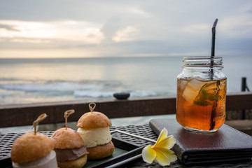 drinks and dessert with ocean view, holiday mood